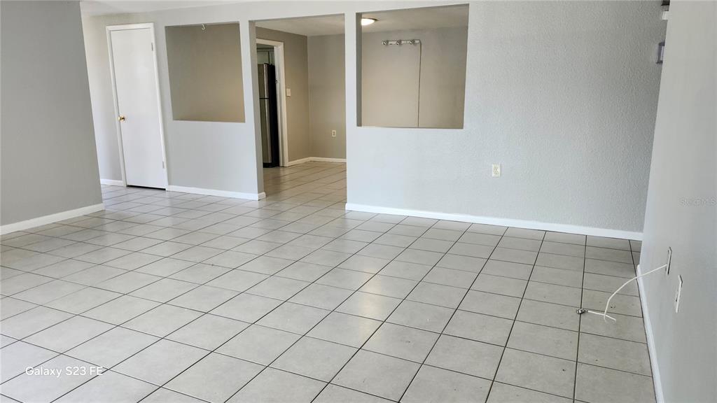 5507 Riddle Road Holiday, FL 34690 - Photo 8 of 18 an empty room & mirror