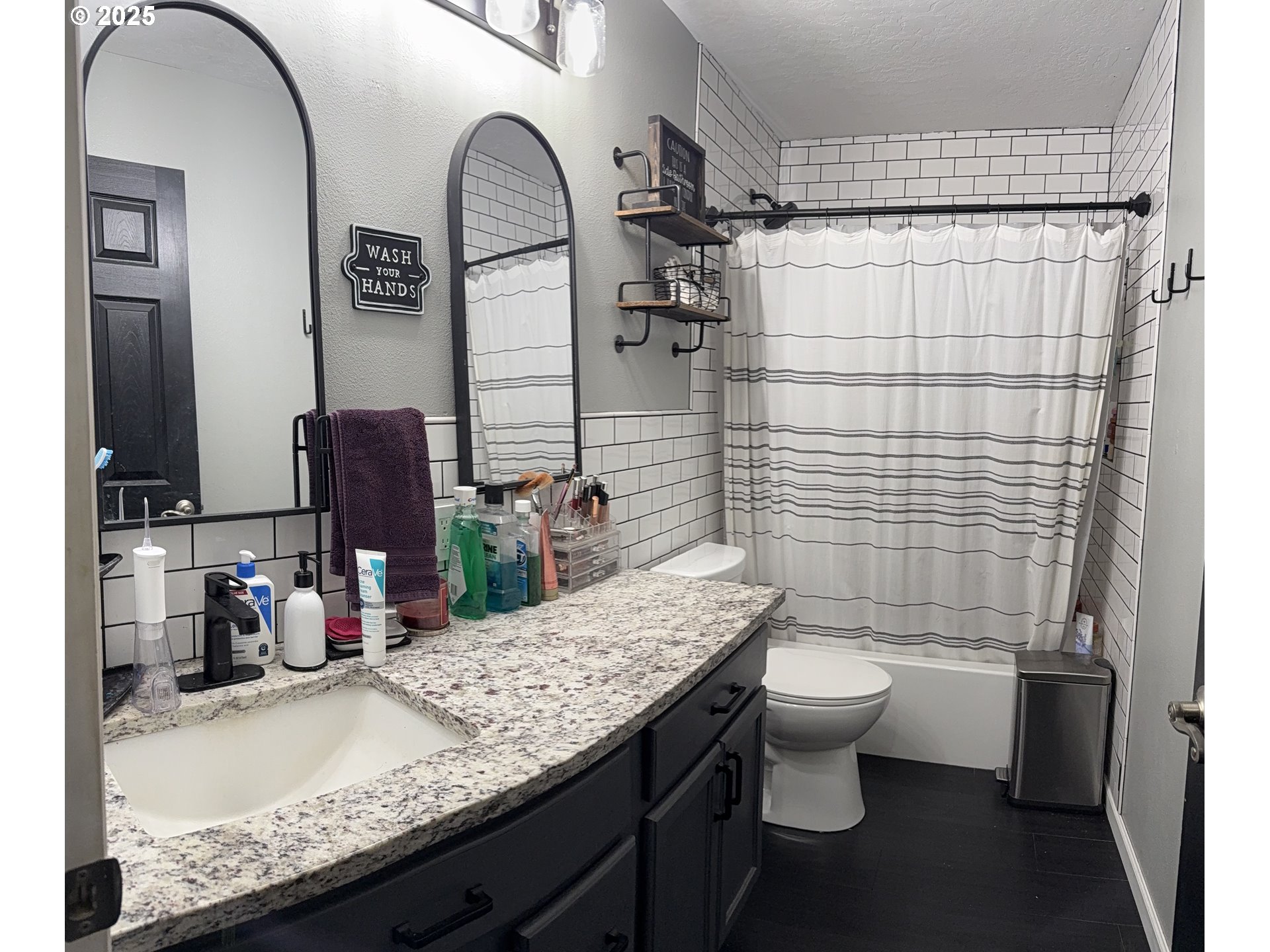 717 West Pheasant Avenue Hermiston, OR 97838 - Photo 11 of 17 a bathroom with a granite countertop sink a toilet and shower
