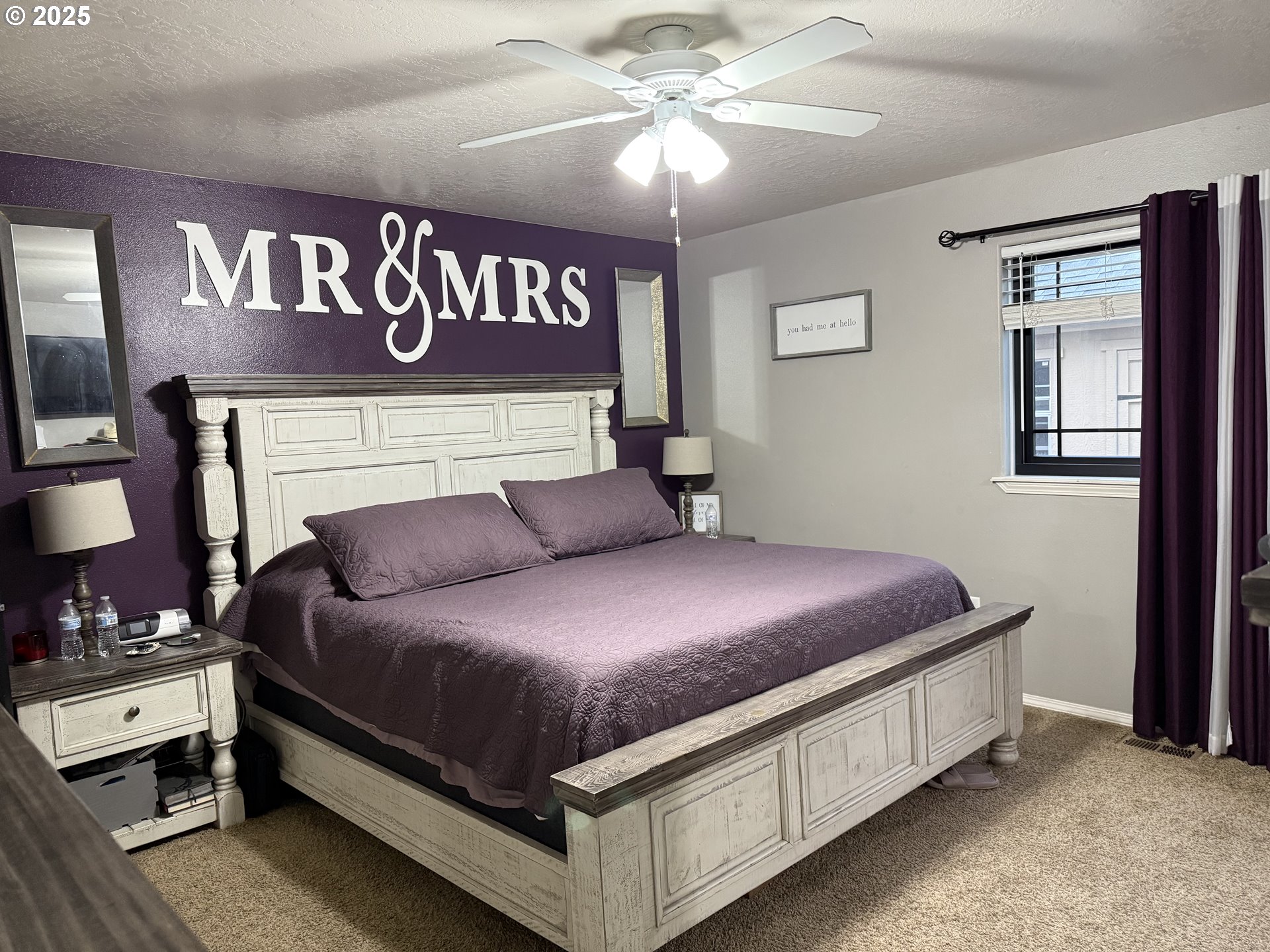 717 West Pheasant Avenue Hermiston, OR 97838 - Photo 12 of 17 a bedroom with a bed and a chandelier