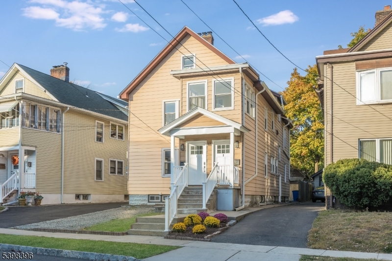 46 James Street, Unit 2 Montclair, NJ 07042 - Photo 19 of 22 a front view of a house with a yard