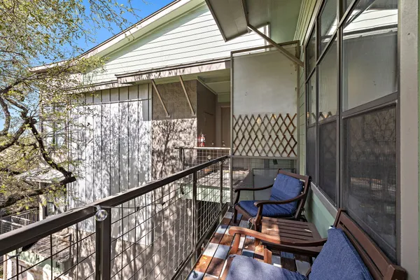 a backyard of a house with lots of trees