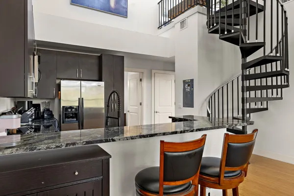 a view of a livingroom with furniture and window
