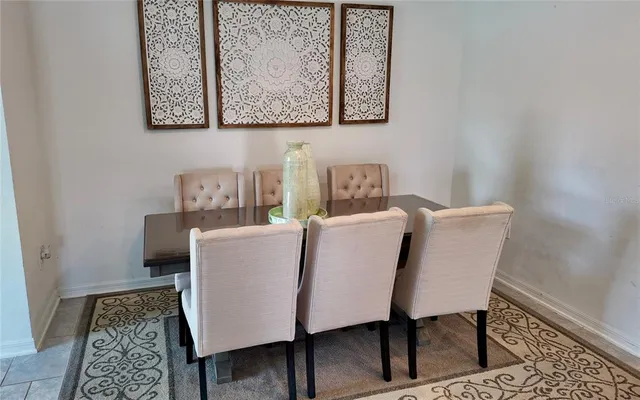 a bedroom with a bed and a television