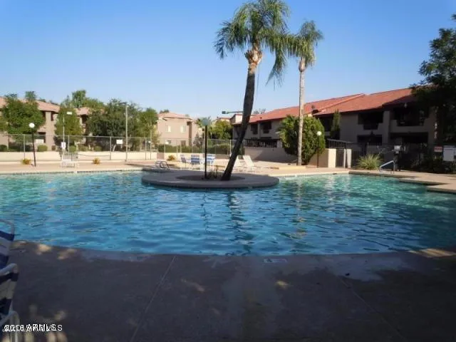a view of a house with swimming pool