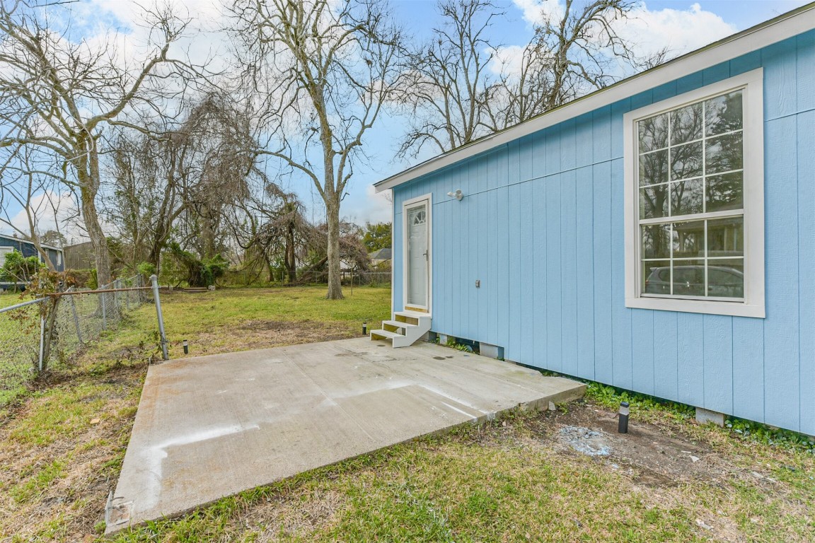 2619 Bellview Street La Marque, TX 77568 - Photo 36 of 46 a view of a backyard with large trees