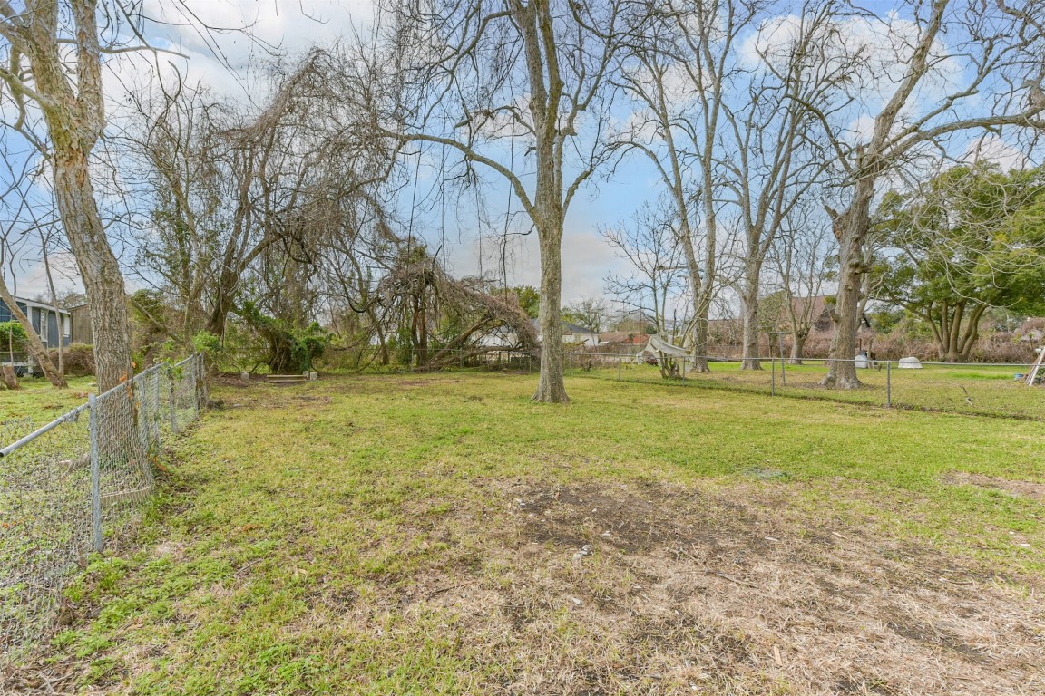 2619 Bellview Street La Marque, TX 77568 - Photo 38 of 46 a huge green field with lots of trees