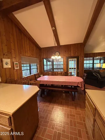 a living room with furniture window and a table