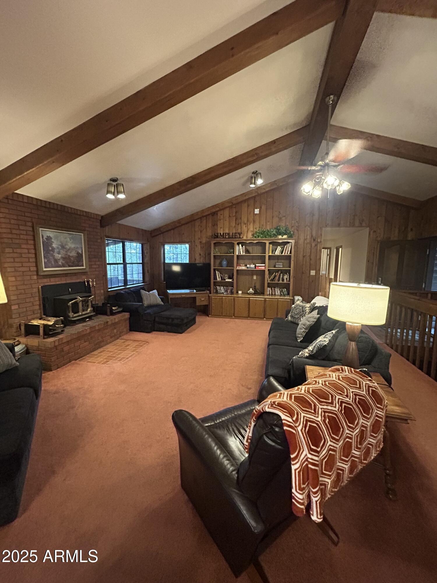 3 County Road Greer, AZ 85927 - Photo 18 of 65 a living room with furniture and a flat screen tv