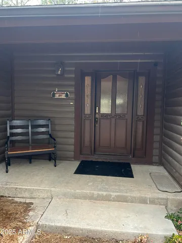 a bathroom with a tub and shower