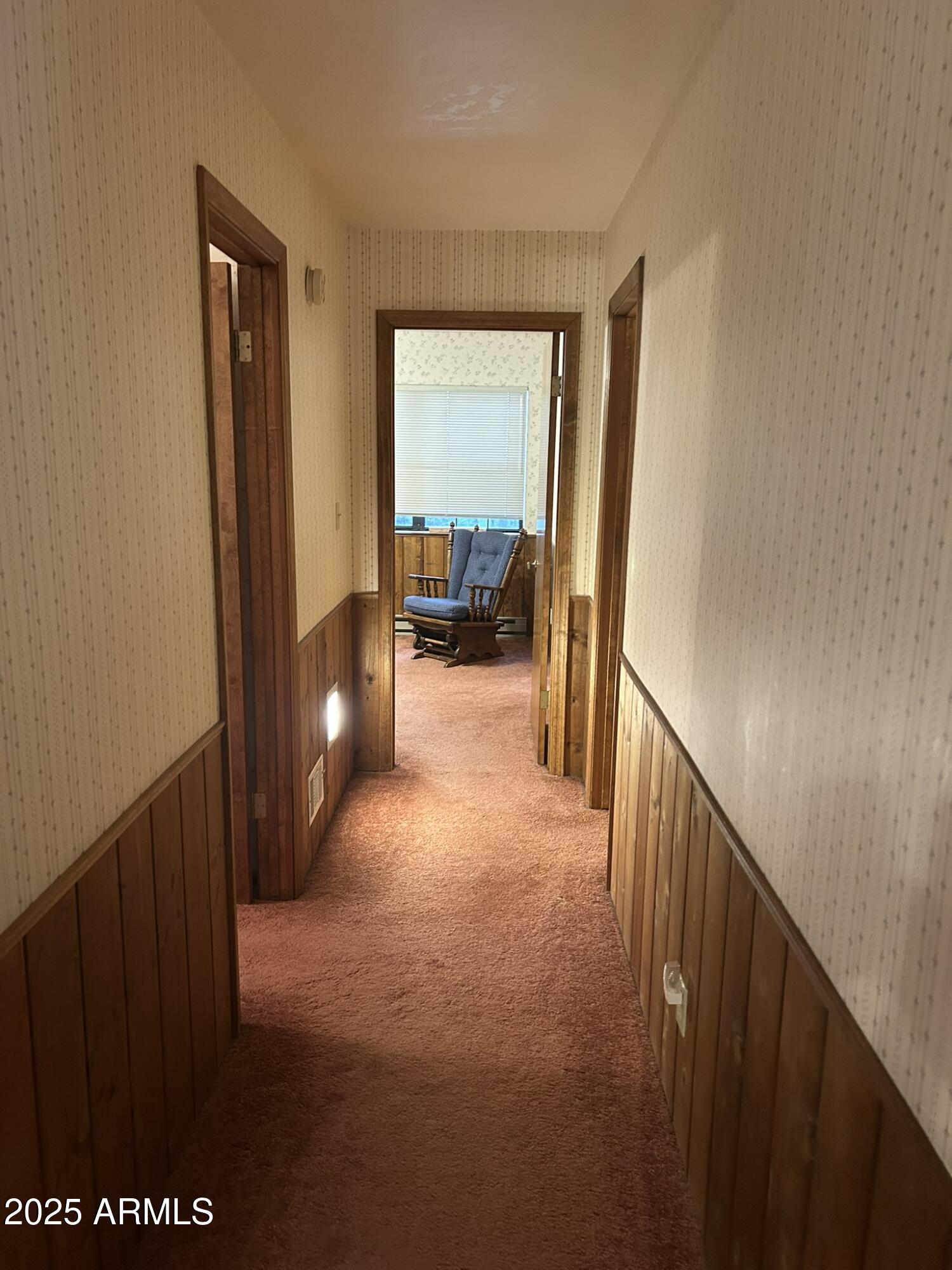 3 County Road Greer, AZ 85927 - Photo 25 of 65 a view of a livingroom from a hallway