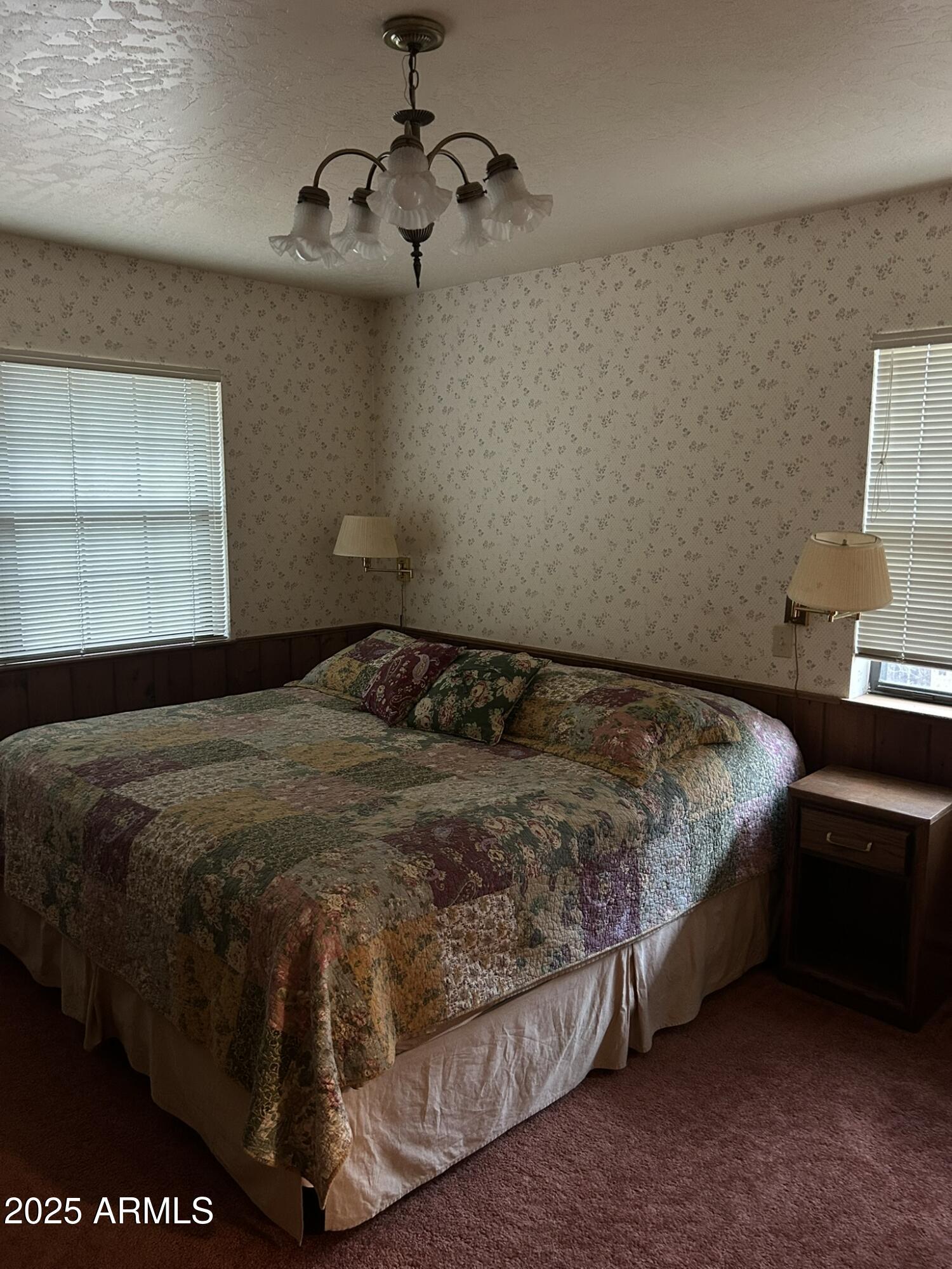 3 County Road Greer, AZ 85927 - Photo 28 of 65 a bedroom with a bed and window