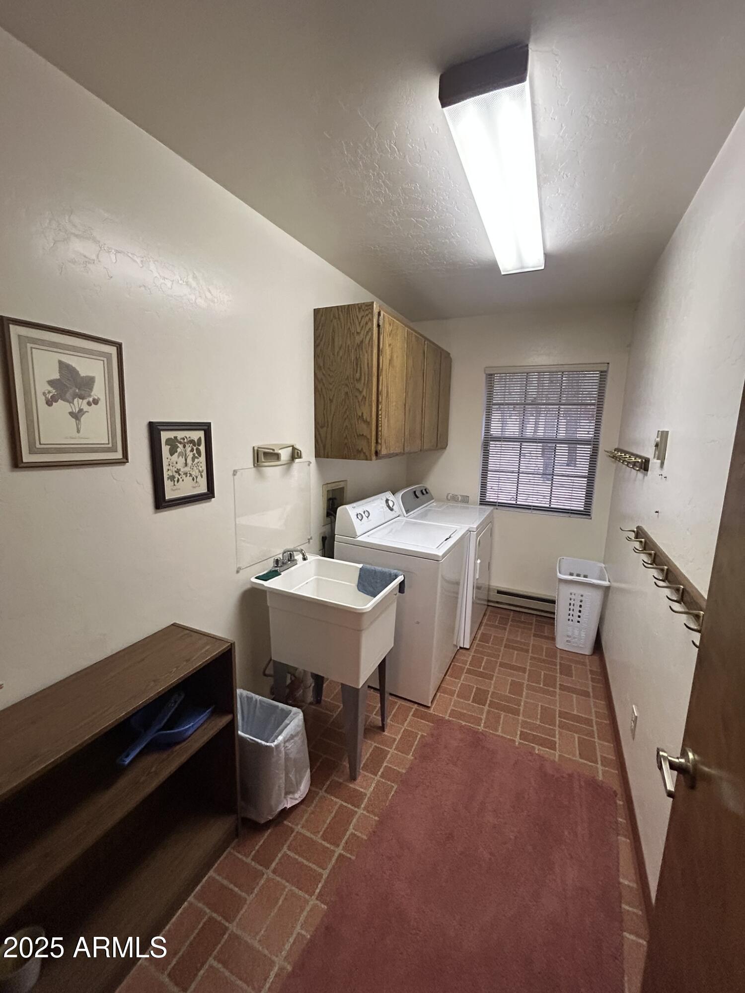 3 County Road Greer, AZ 85927 - Photo 41 of 65 a room with furniture a rug and a window