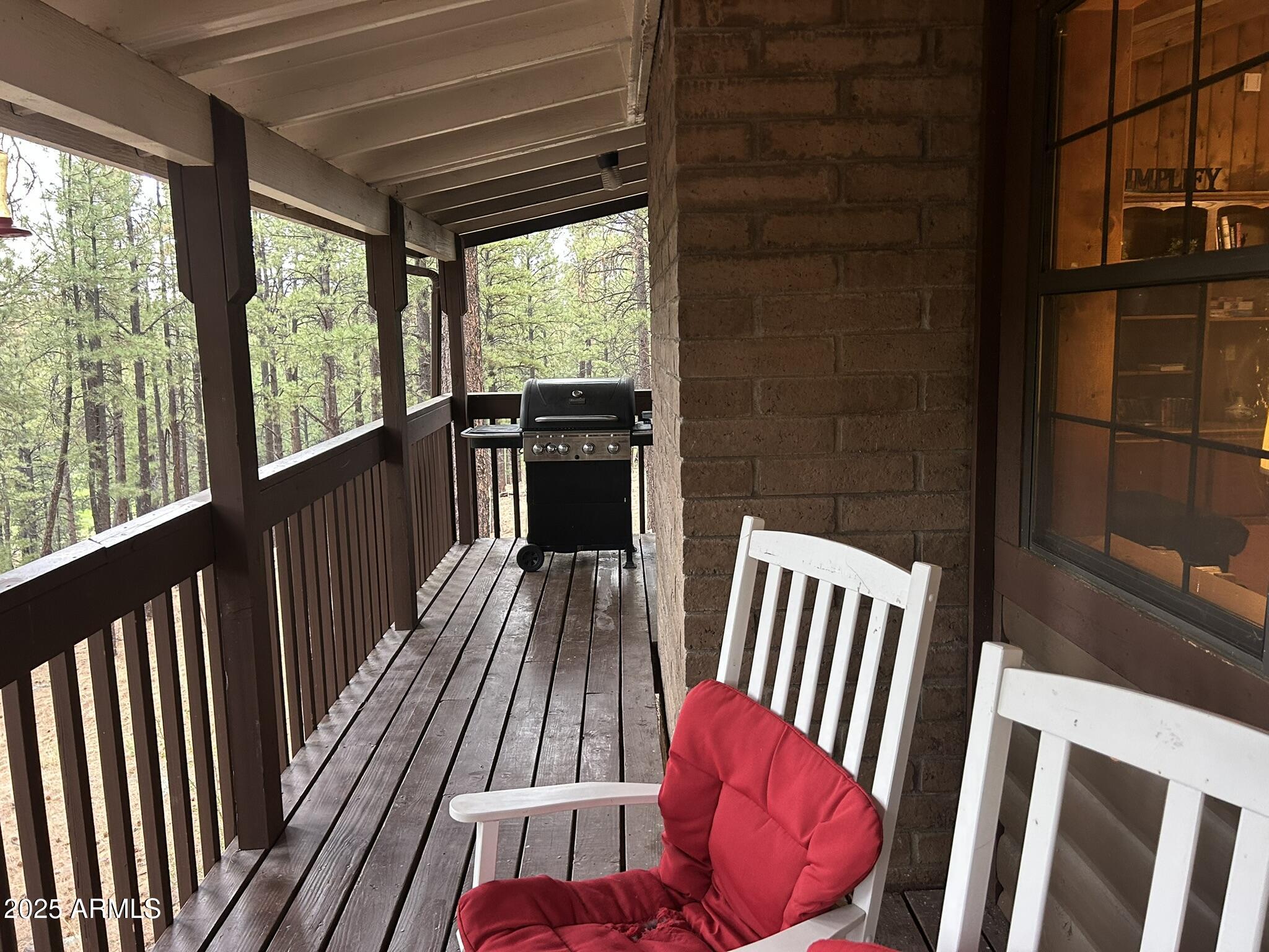 3 County Road Greer, AZ 85927 - Photo 10 of 65 a view of balcony with furniture
