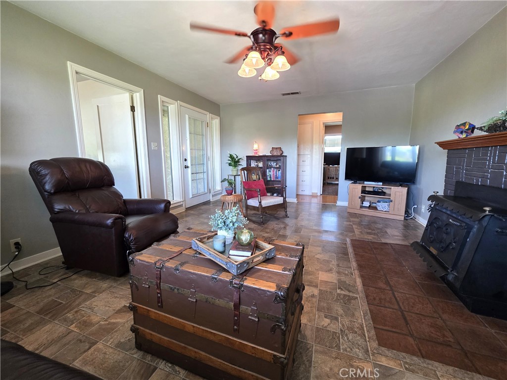 23773 River Road Corning, CA 96021 - Photo 4 of 64 a living room with furniture fireplace and flat screen tv