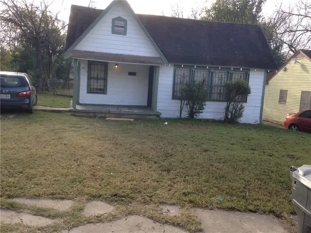 a house view with a garden space