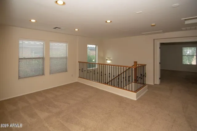 a view of a livingroom with a ceiling fan