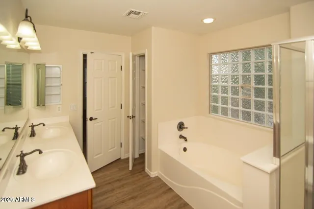 a bathroom with a shower and a toilet