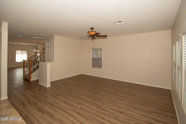 a view of a livingroom with wooden floor