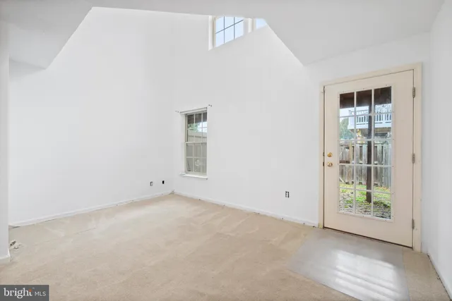 an empty room with windows