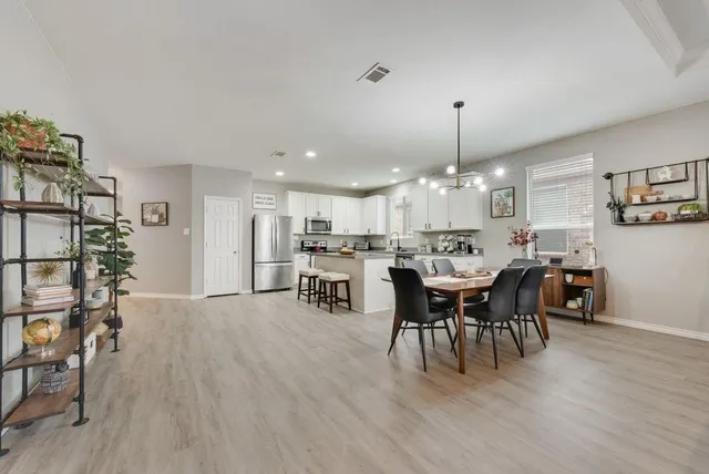 a front view of house with yard and barbeque oven