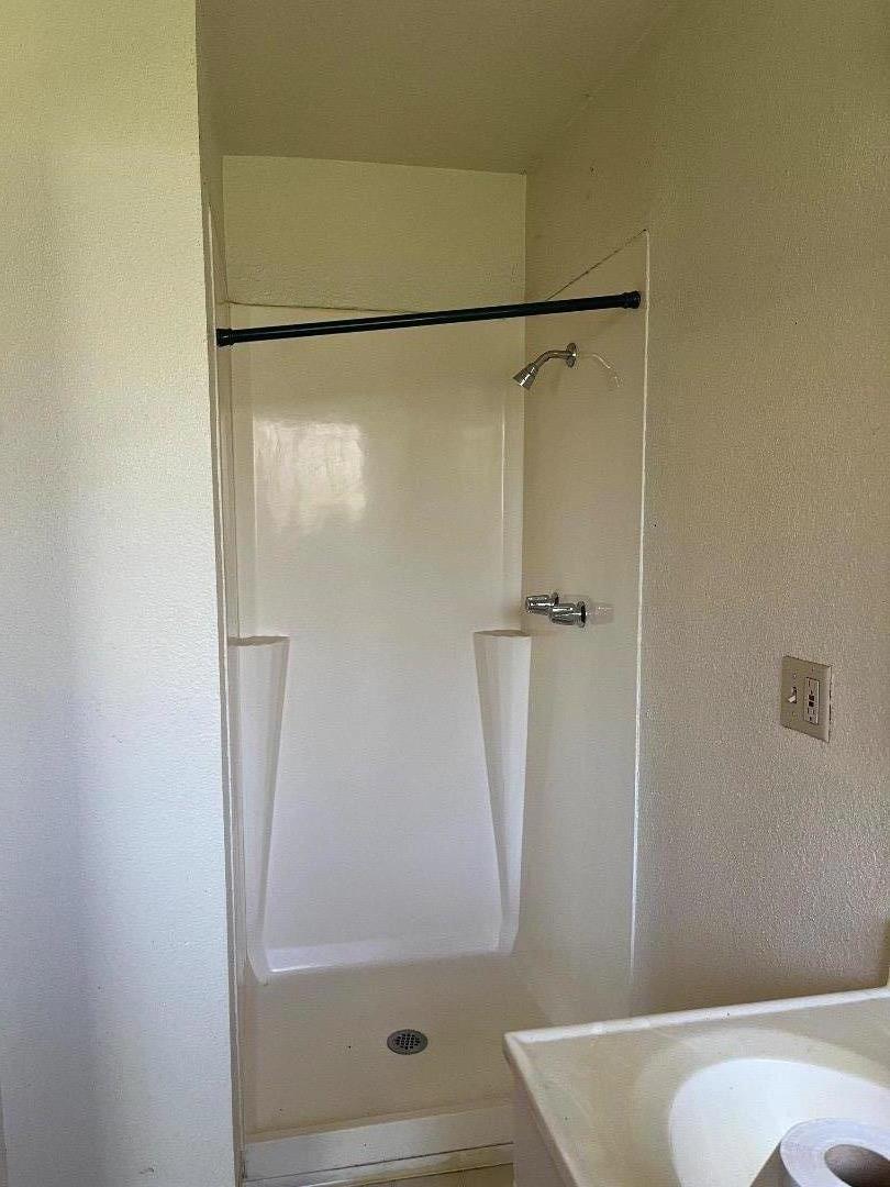 306 Maya Circle Soledad, CA 93960 - Photo 16 of 16 a bathroom with a shower