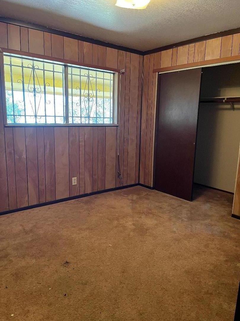 306 Maya Circle Soledad, CA 93960 - Photo 8 of 16 a view of an empty room with a window