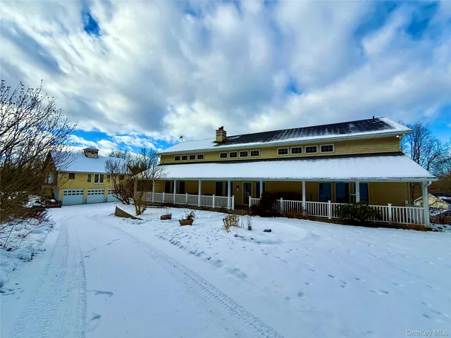 a view of a large building with a yard