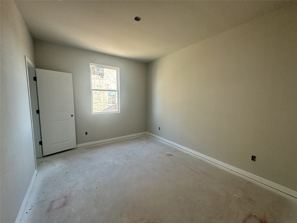 1800 Davee Place Georgetown, TX 78633 - Photo 11 of 32 an empty room with windows and closet