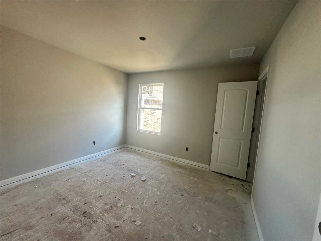 1800 Davee Place Georgetown, TX 78633 - Photo 24 of 32 an empty room with windows and closet