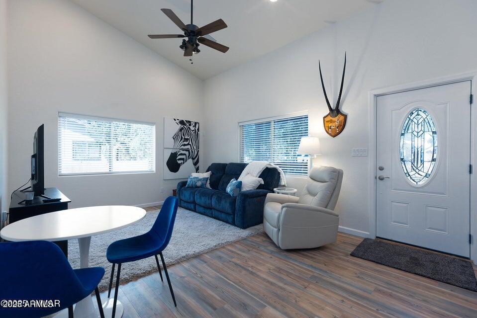 2145 Cottontail Road Overgaard, AZ 85933 - Photo 9 of 22 a living room with furniture and a window
