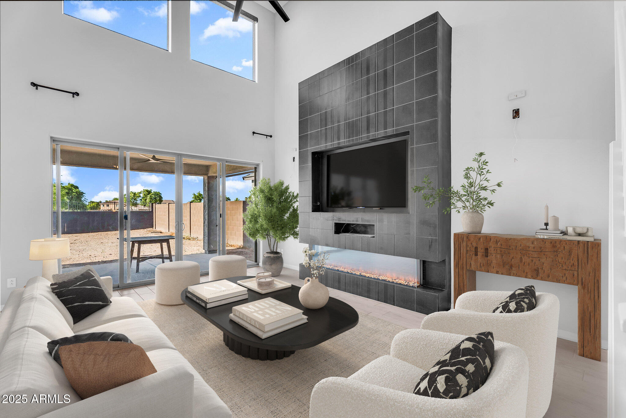 6732 West Coles Road Laveen, AZ 85339 - Photo 8 of 41 a living room with furniture and a flat screen tv