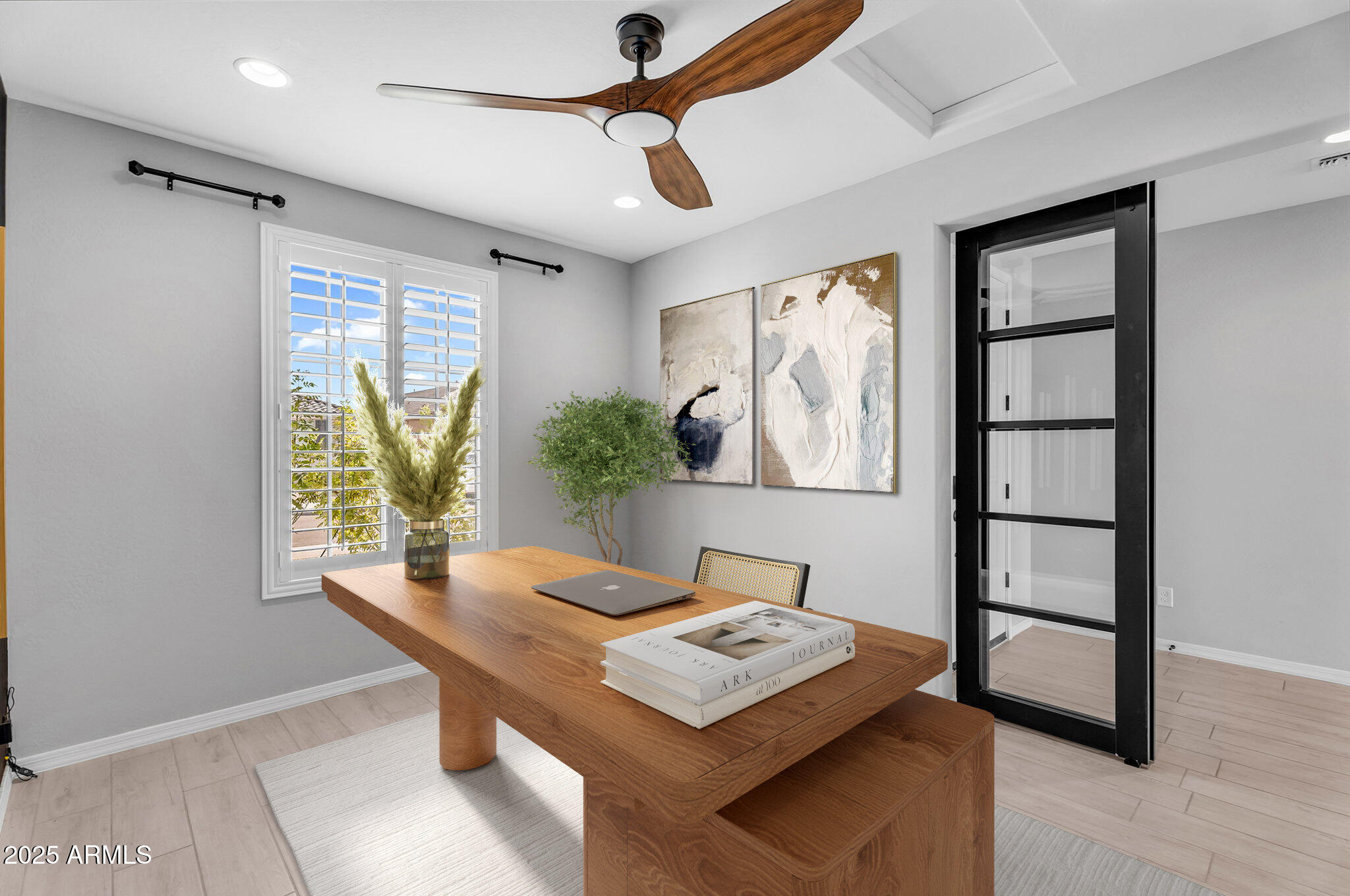 6732 West Coles Road Laveen, AZ 85339 - Photo 11 of 41 a view of a workspace with furniture and a window