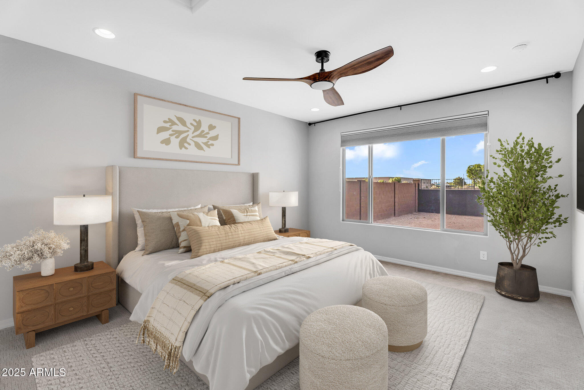 6732 West Coles Road Laveen, AZ 85339 - Photo 12 of 41 a bedroom with a bed and a potted plant