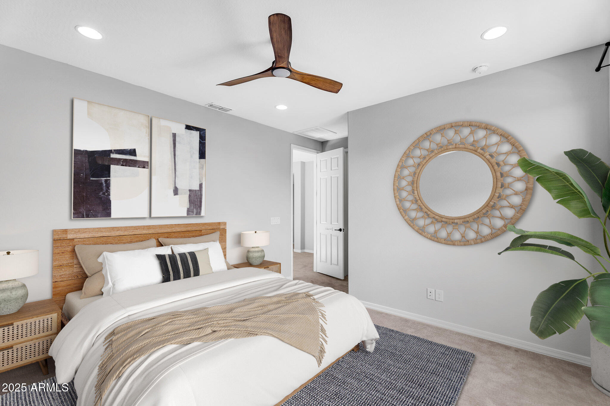 6732 West Coles Road Laveen, AZ 85339 - Photo 19 of 41 a bedroom with a bed and a mirror