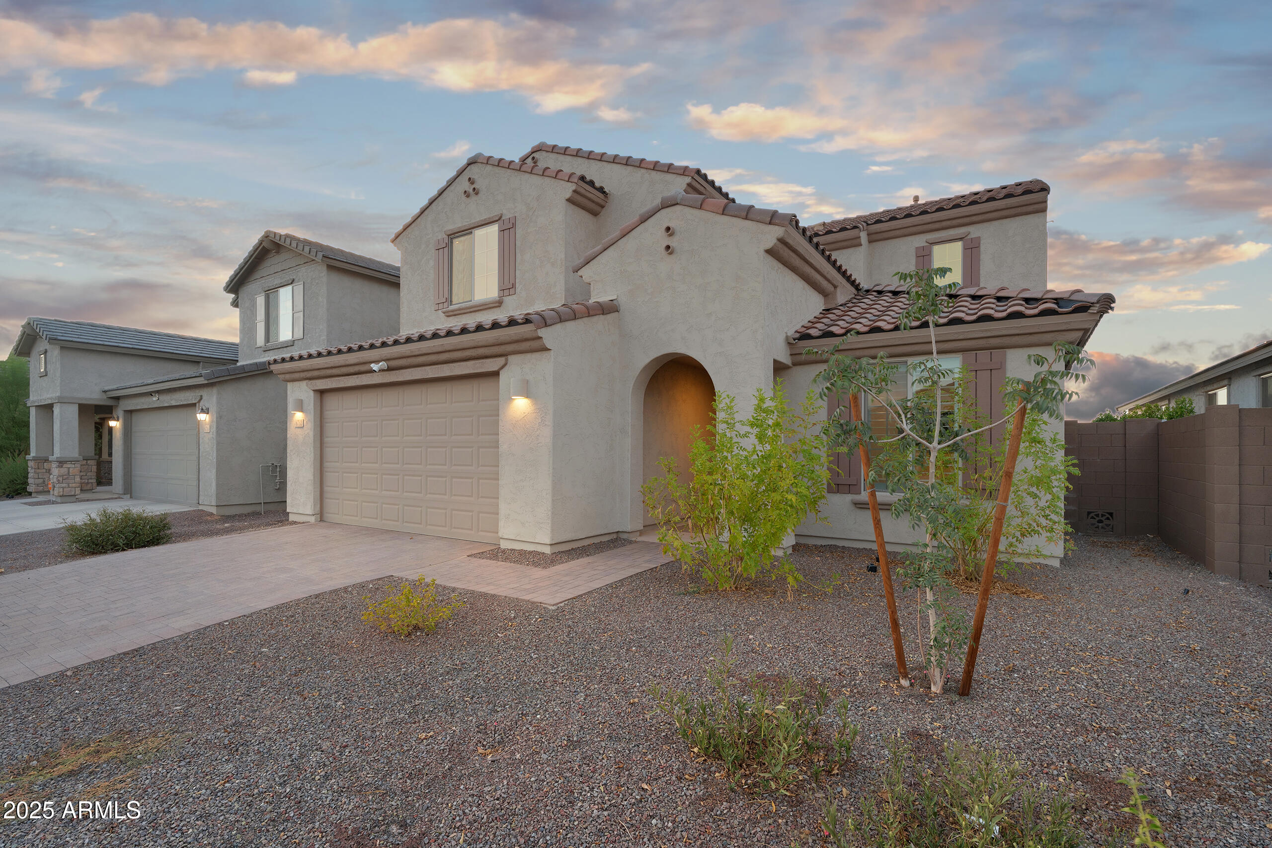 6732 West Coles Road Laveen, AZ 85339 - Photo 2 of 41 front view of a house with glass doors