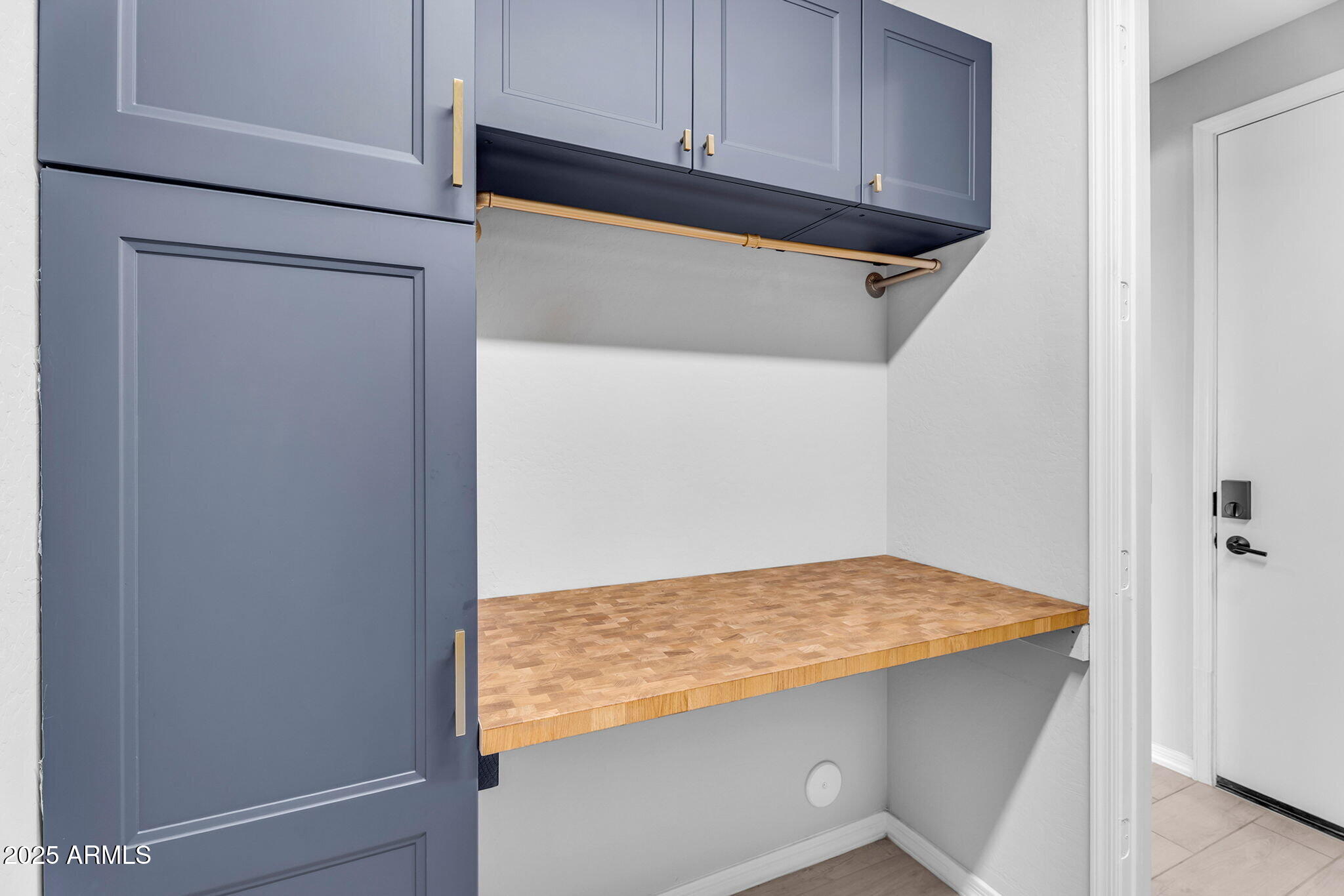 6732 West Coles Road Laveen, AZ 85339 - Photo 28 of 41 a view of storage and utility room with wooden floor