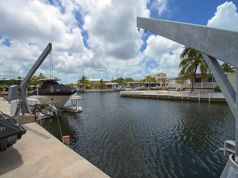 1133 Gulfstream Lane Key Largo, FL 33037 - Photo 10 of 13 Concrete Dock with Davits