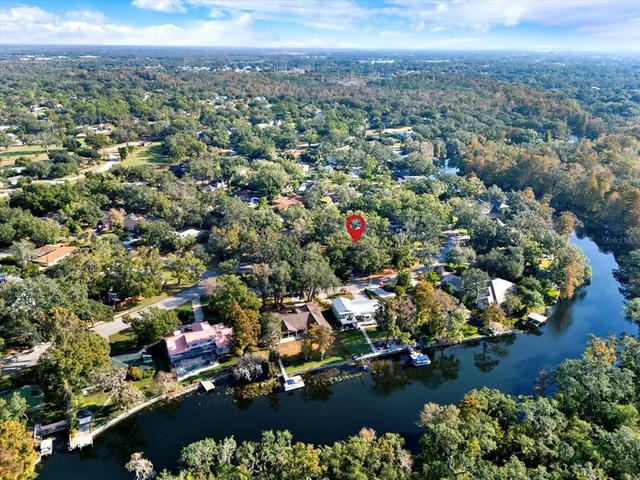 an aerial view of city and lake view