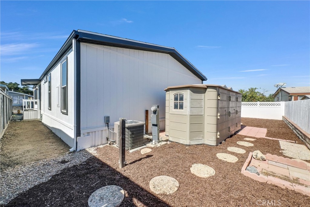 21650 Temescal Canyon Road, Unit 26 Corona, CA 92883 - Photo 31 of 32 a backyard of a house