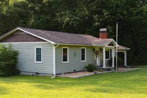 a view of a house with a swimming pool