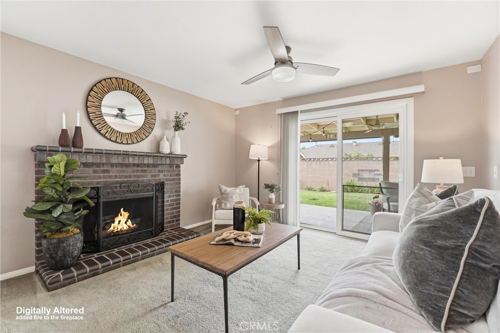 544 Firethorne Street Brea, CA 92821 - Photo 11 of 39 Family Room with gas, wood-burning fireplace, and sliding glass door to the backyard!