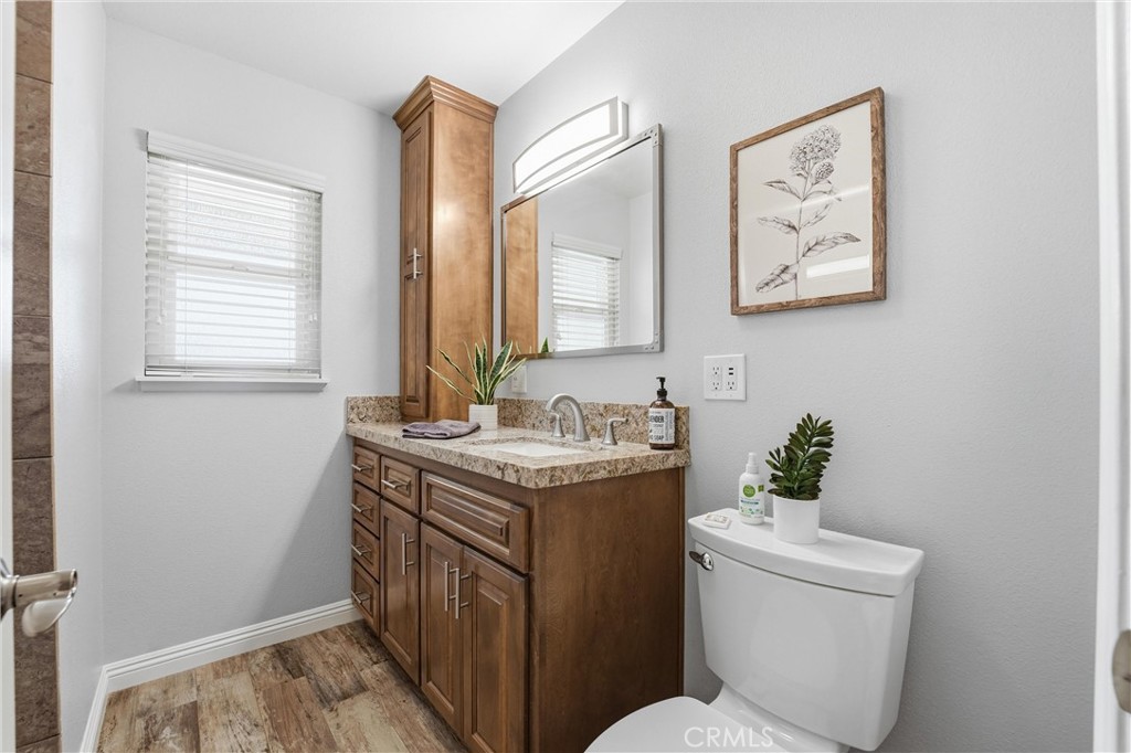 544 Firethorne Street Brea, CA 92821 - Photo 27 of 39 Bathroom #2 has been tastefully remodeled and has solid wood cabinetry and granite countertops!