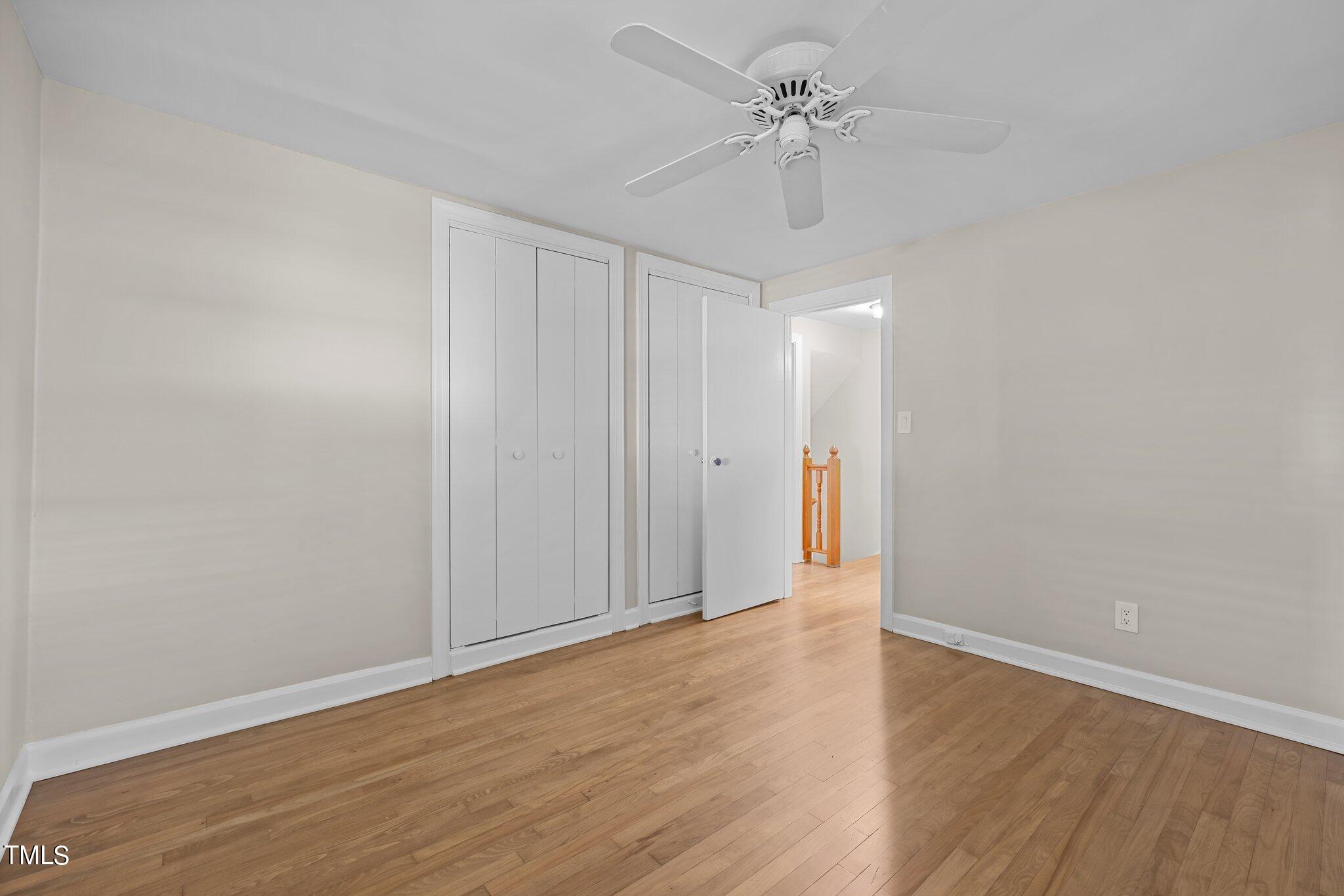 705 Bryan Street Raleigh, NC 27605 - Photo 28 of 42 a view of an empty room with wooden floor