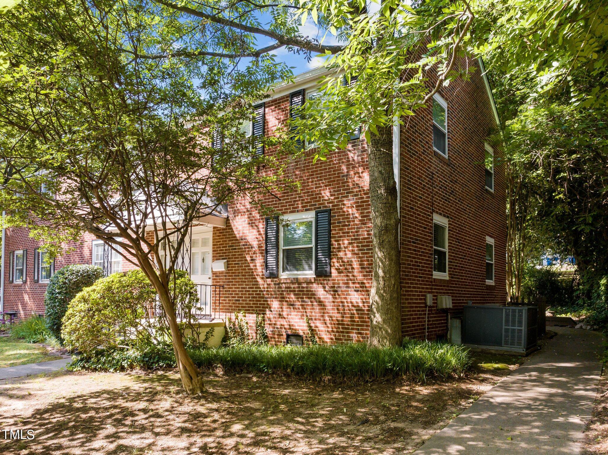 705 Bryan Street Raleigh, NC 27605 - Photo 33 of 42 a view of a house with a yard