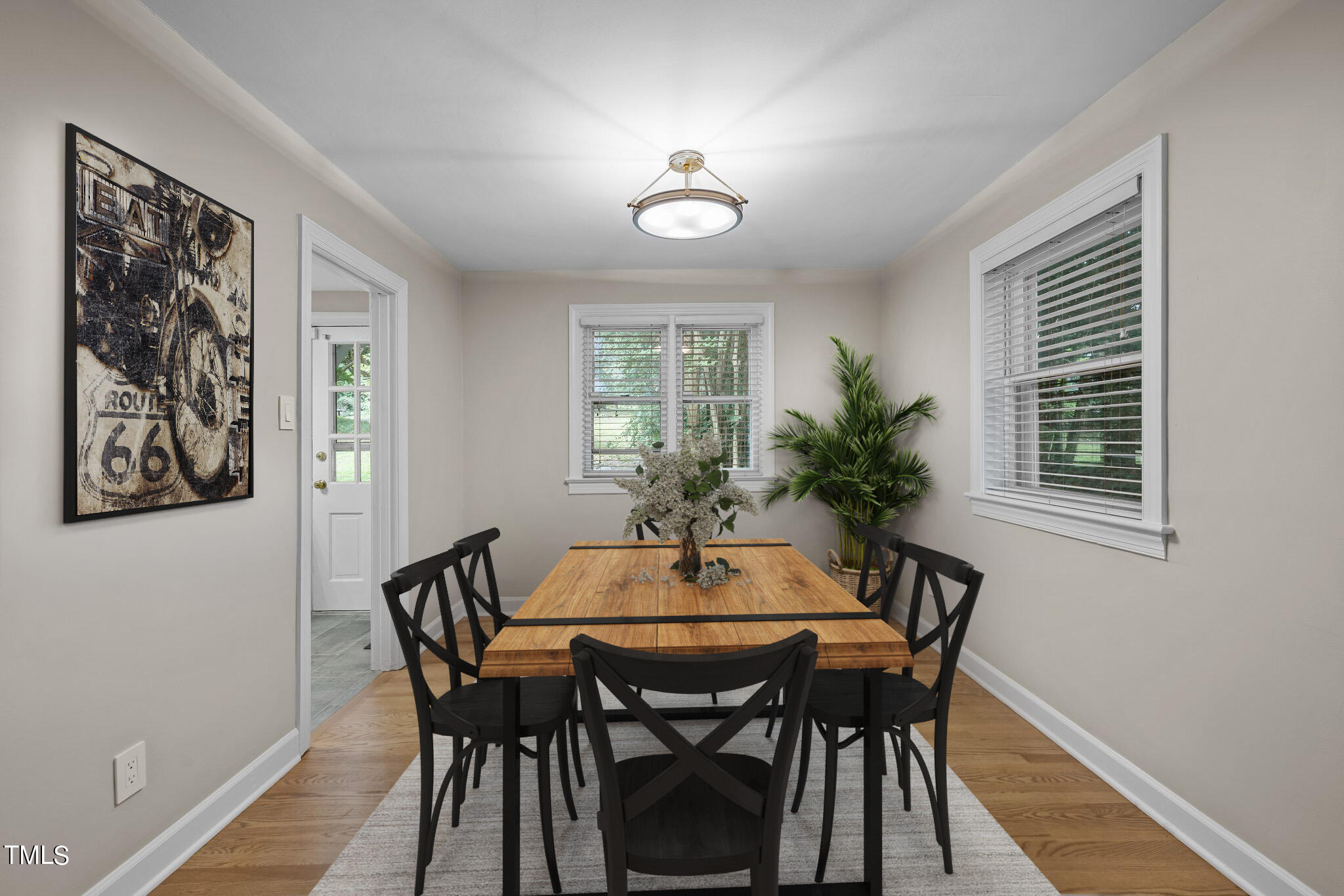 705 Bryan Street Raleigh, NC 27605 - Photo 5 of 42 a dining room with furniture and window