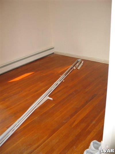 5258 Camp Meeting Road Center Valley, PA 18034 - Photo 7 of 9 1st floor bedroom with hardwood floors