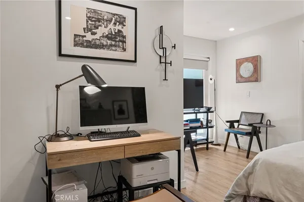 a view of a workspace with furniture