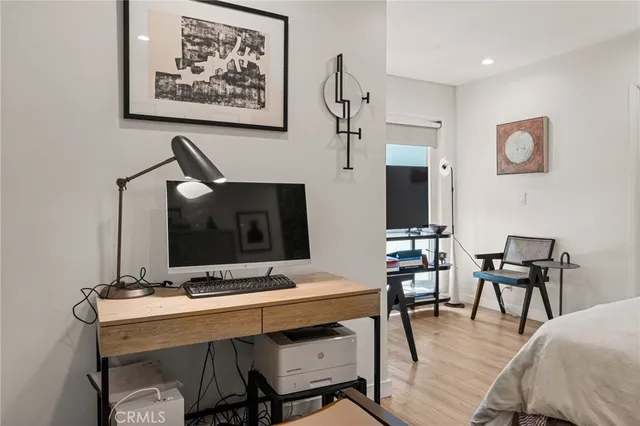 a view of a workspace with furniture
