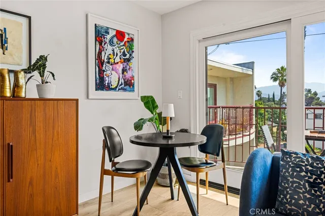 a view of a livingroom with furniture and wooden floor