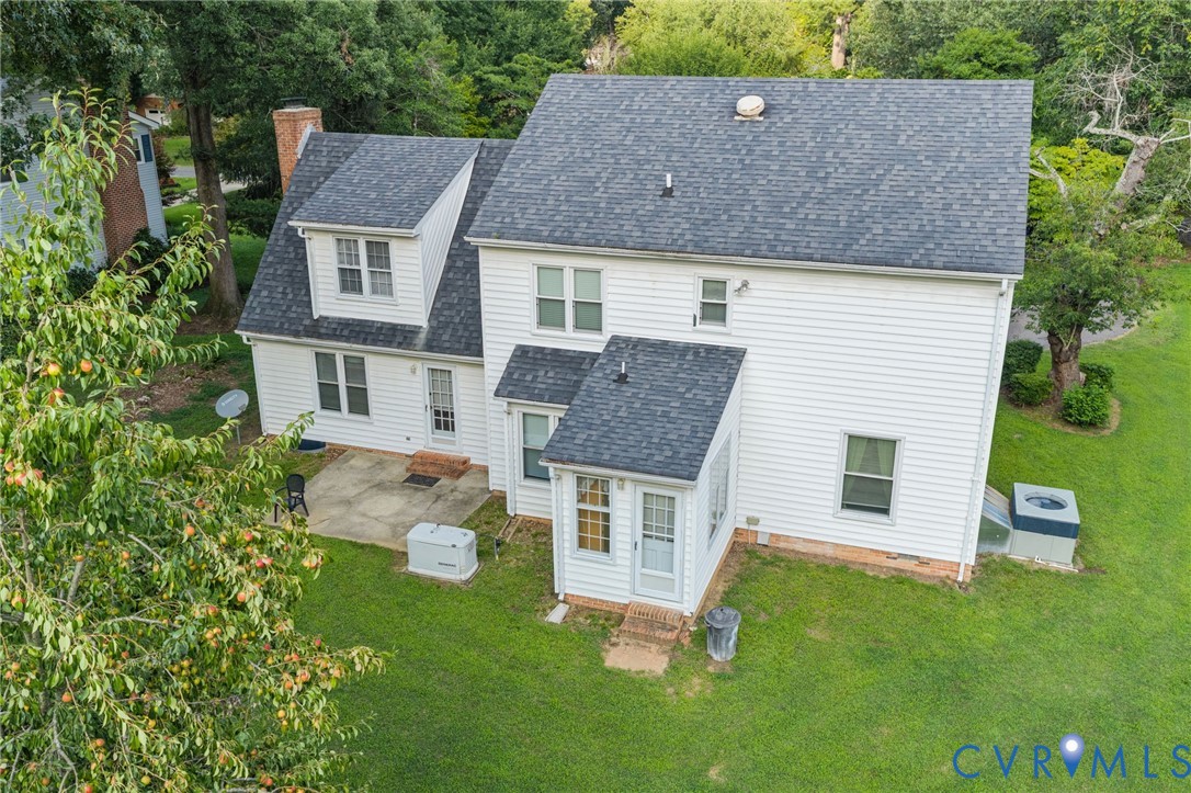 1760 Gloucester Road Gloucester Point, VA 23062 - Photo 5 of 47 Rear exterior featuring white siding, a dark shing